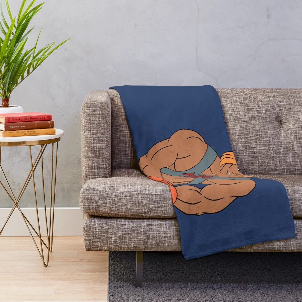 Retro-inspired Masters of the Universe plush blanket featuring He-Man, Skeletor, and other classic characters