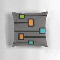 Mid-century modern abstract accent pillow with oval shapes and retro-inspired design