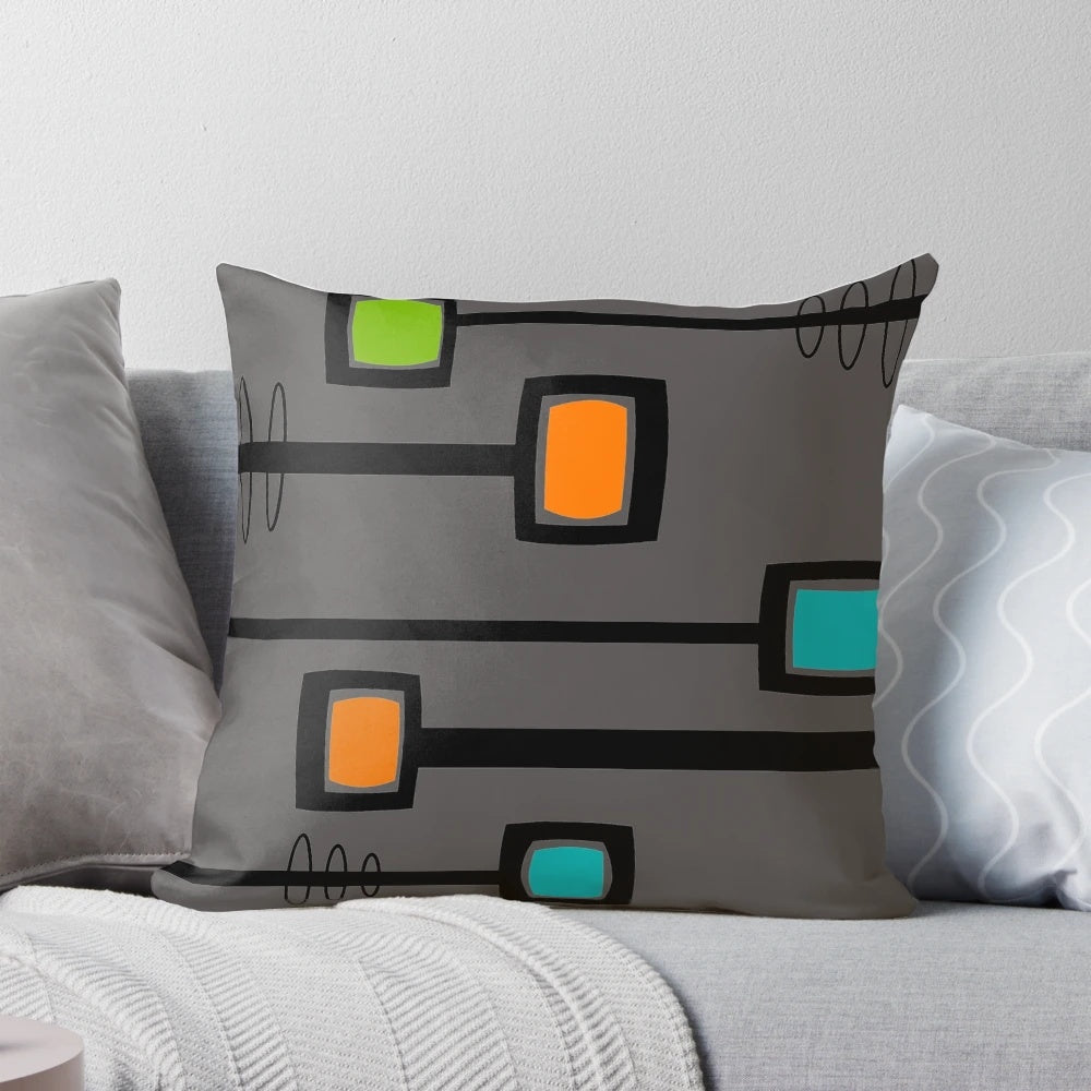 Mid-century modern abstract accent pillow with oval shapes and retro-inspired design
