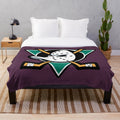 Mighty Ducks-themed plush blanket with hockey elements