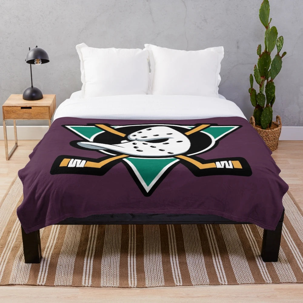 Mighty Ducks-themed plush blanket with hockey elements