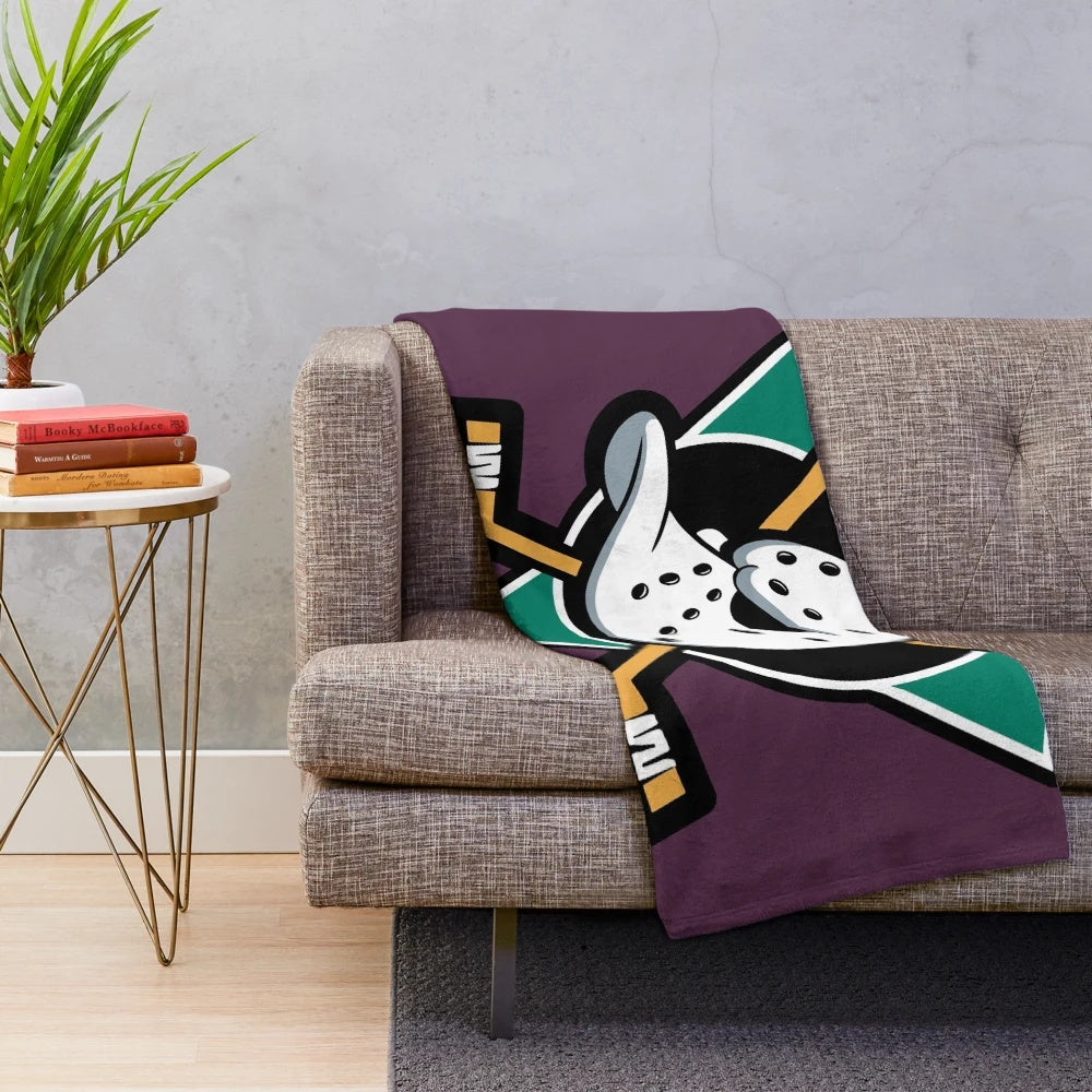 Mighty Ducks-themed plush blanket with hockey elements