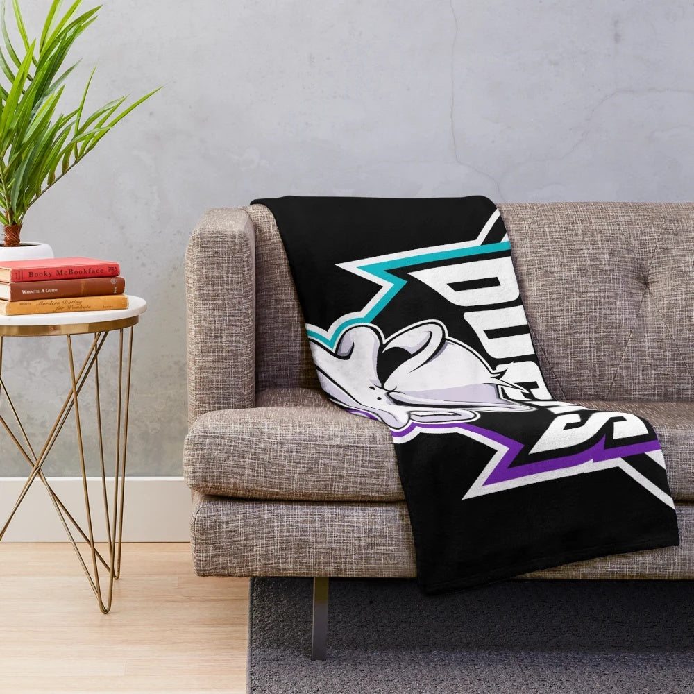 Mighty Ducks themed plush blanket featuring hockey player graphics