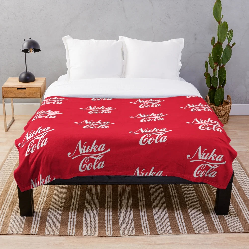 Nuka Cola themed retro plush blanket with Fallout game logo