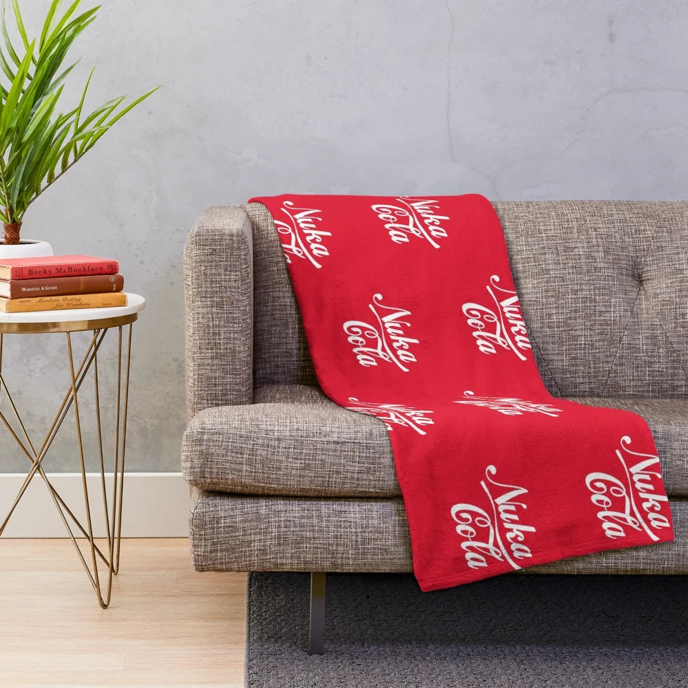 Nuka Cola themed retro plush blanket with Fallout game logo