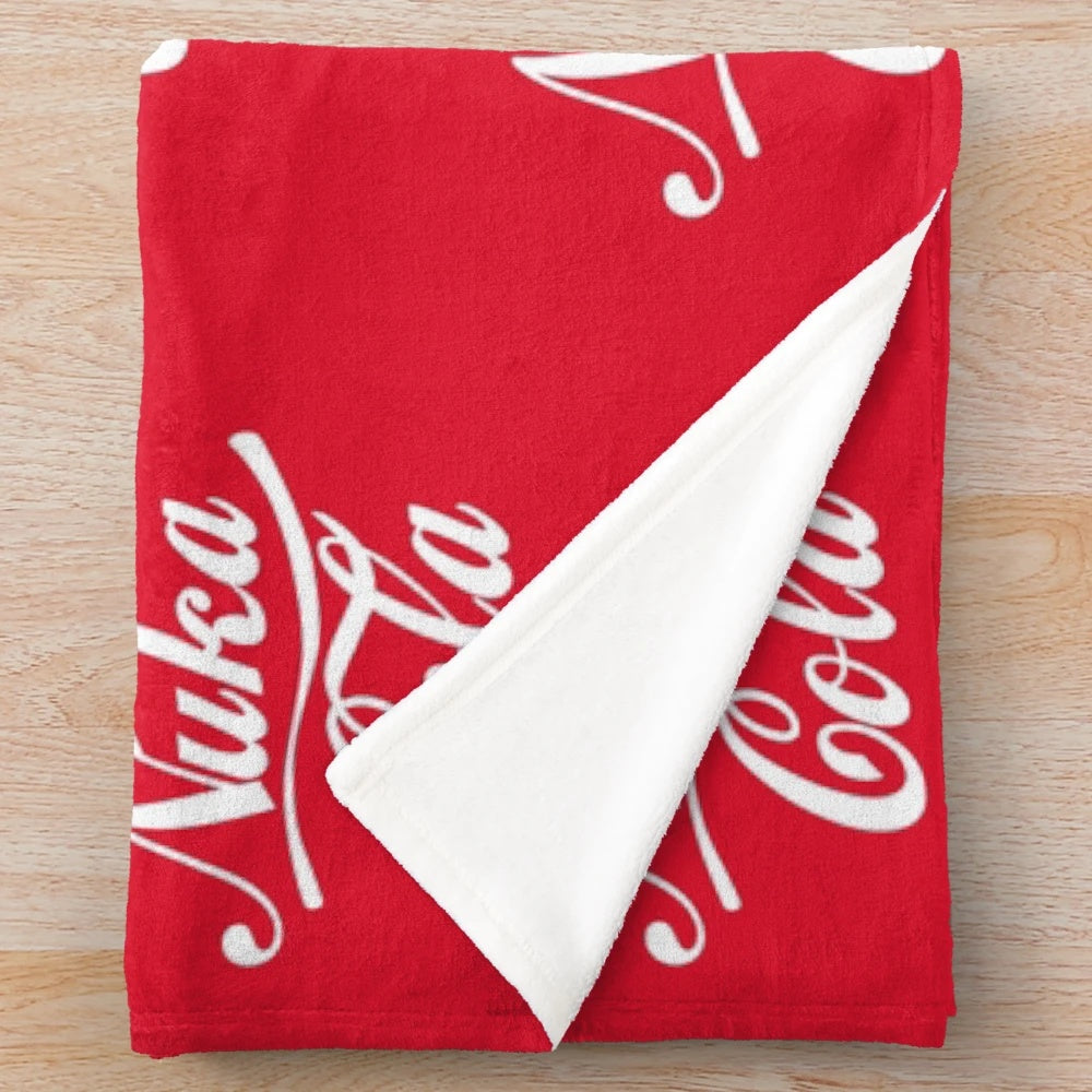 Nuka Cola themed retro plush blanket with Fallout game logo