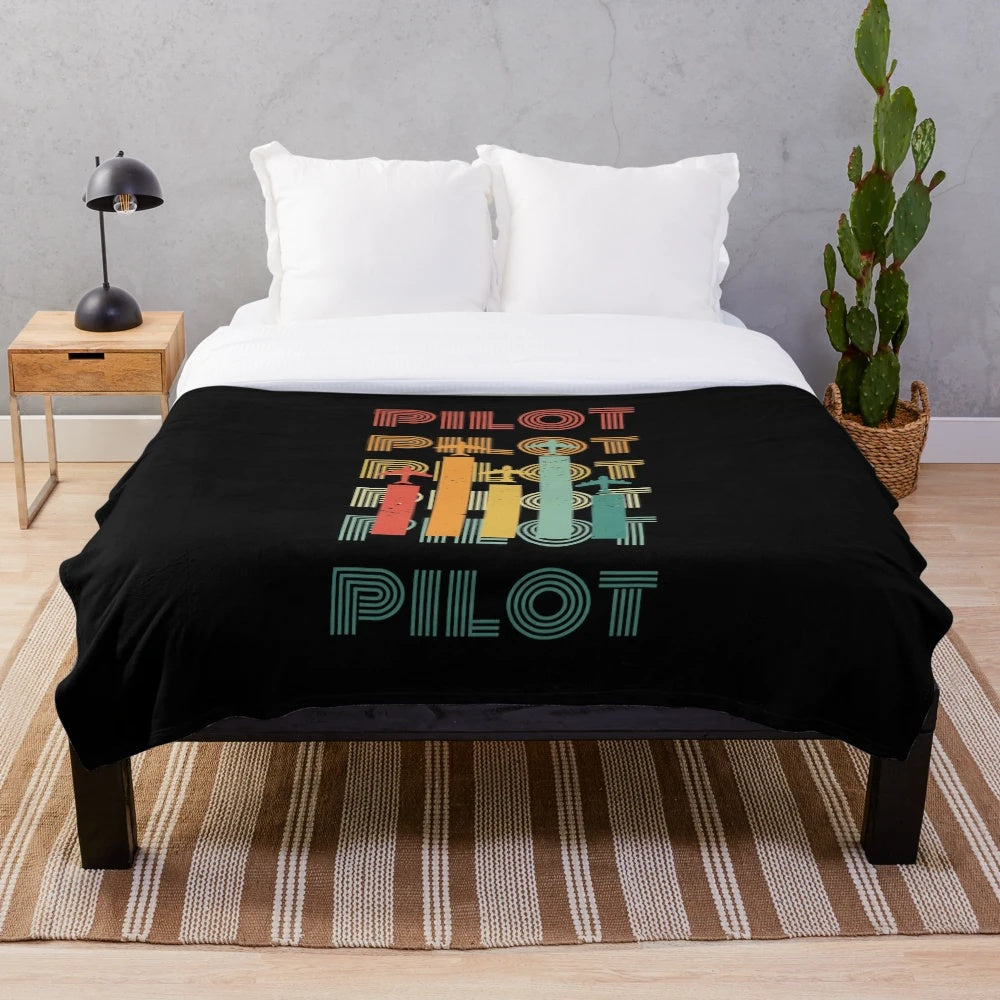 Retro-inspired plush blanket featuring an airplane design, perfect for aviation enthusiasts