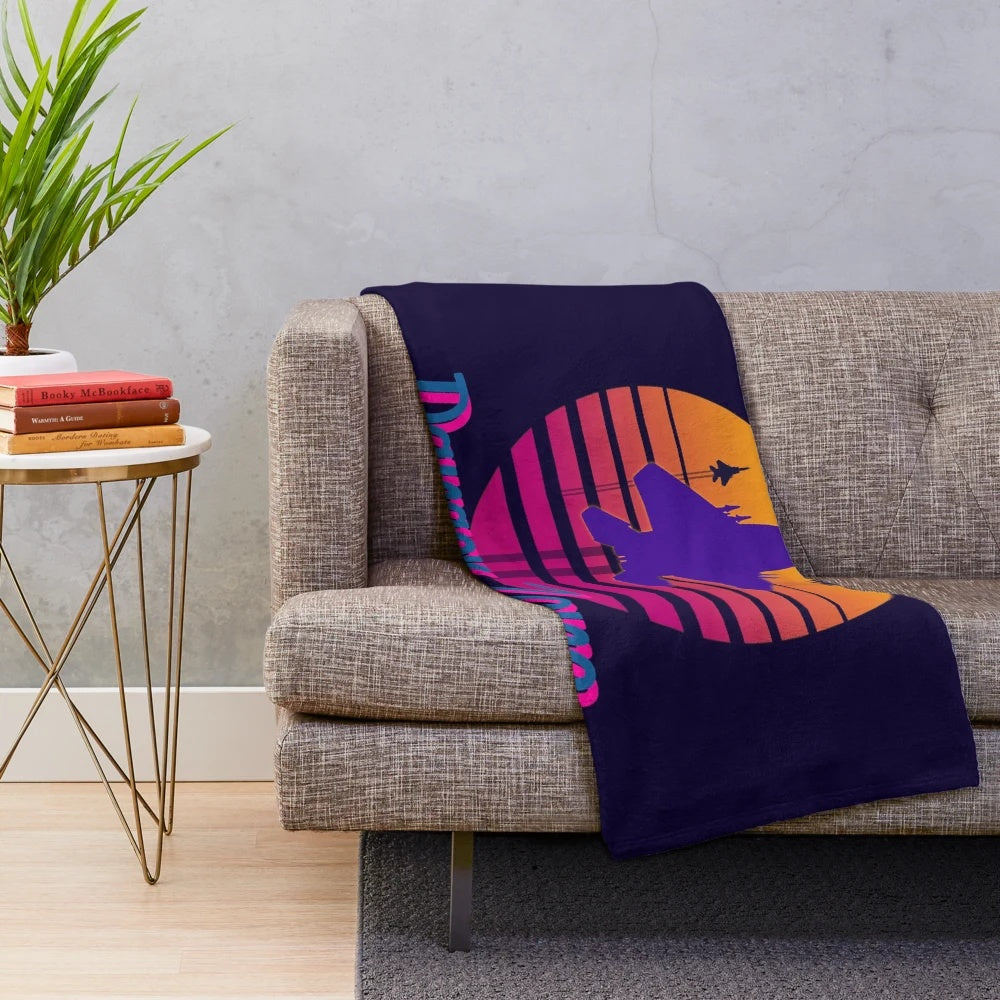Plush blanket with retro 80s 90s design featuring aviation, pop culture, and vaporwave elements