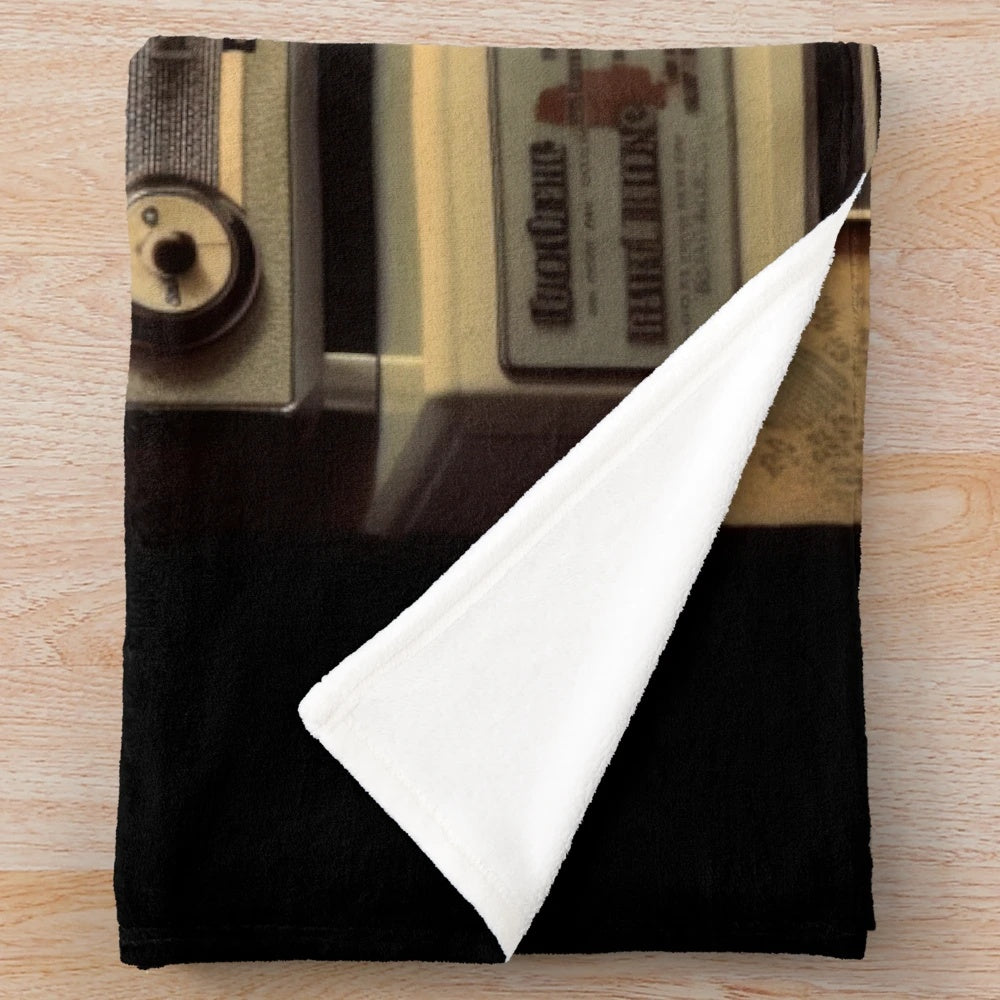 Cozy plush blanket with vintage movie-inspired design