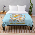 Soft, plush blanket with vintage-inspired design to promote relaxation and sleep