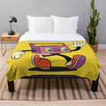 Retro-inspired plush blanket featuring a vintage radio design