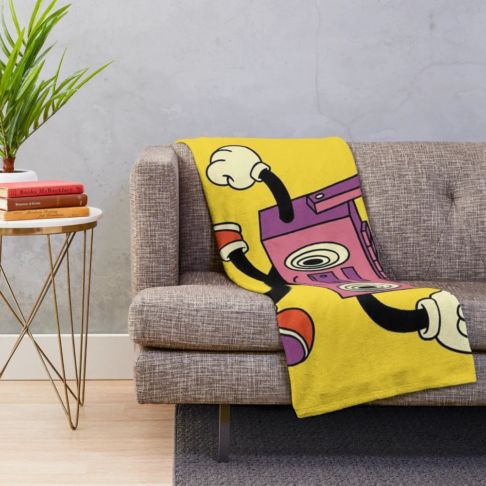 Retro-inspired plush blanket featuring a vintage radio design