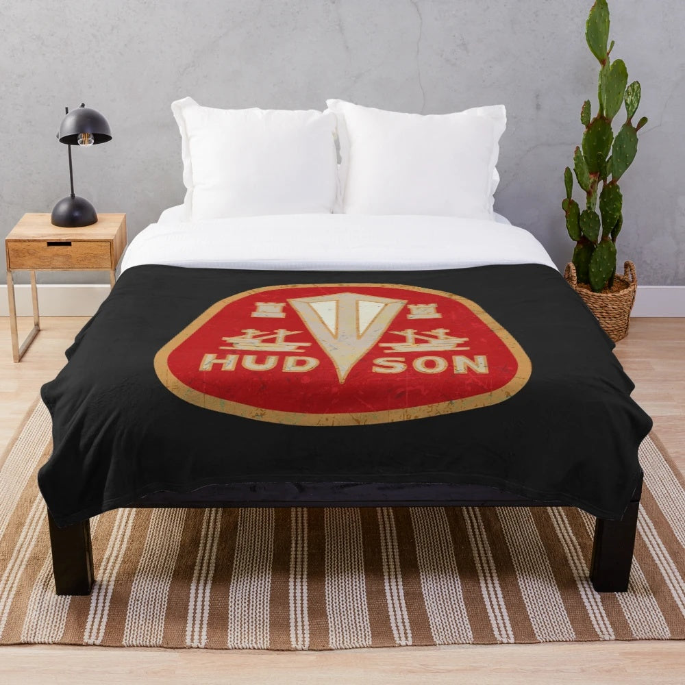 Cozy plush blanket featuring the vintage Hudson Motor Corporation logo