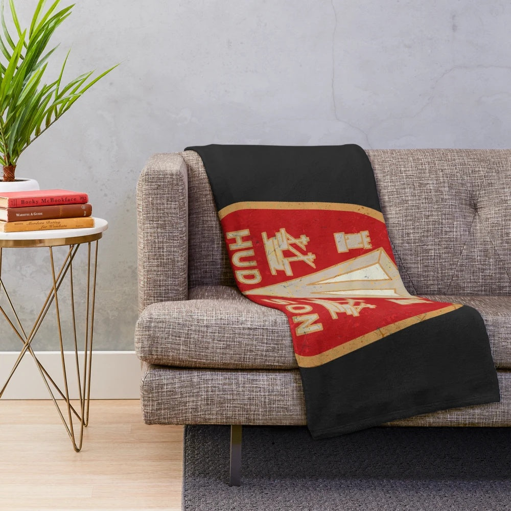 Cozy plush blanket featuring the vintage Hudson Motor Corporation logo