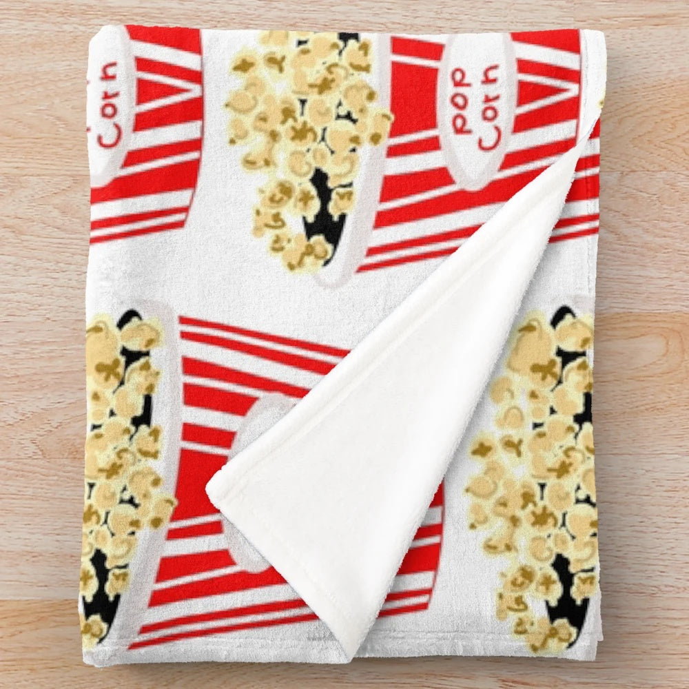 Retro-inspired plush blanket with vintage movie popcorn design