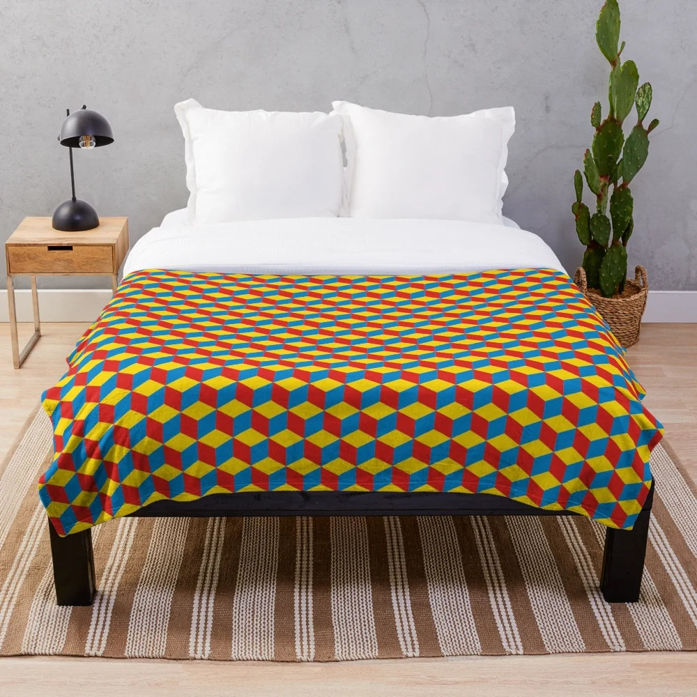 Plush blanket with retro Qbert-inspired 3D cube and color block design