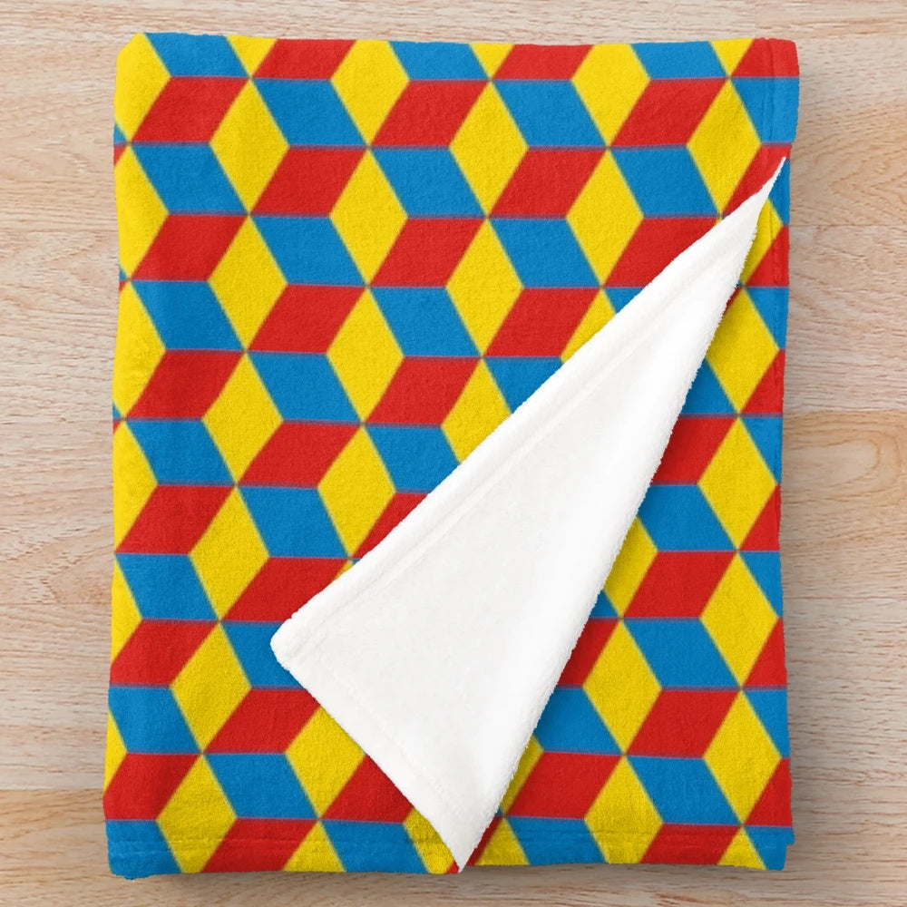 Plush blanket with retro Qbert-inspired 3D cube and color block design