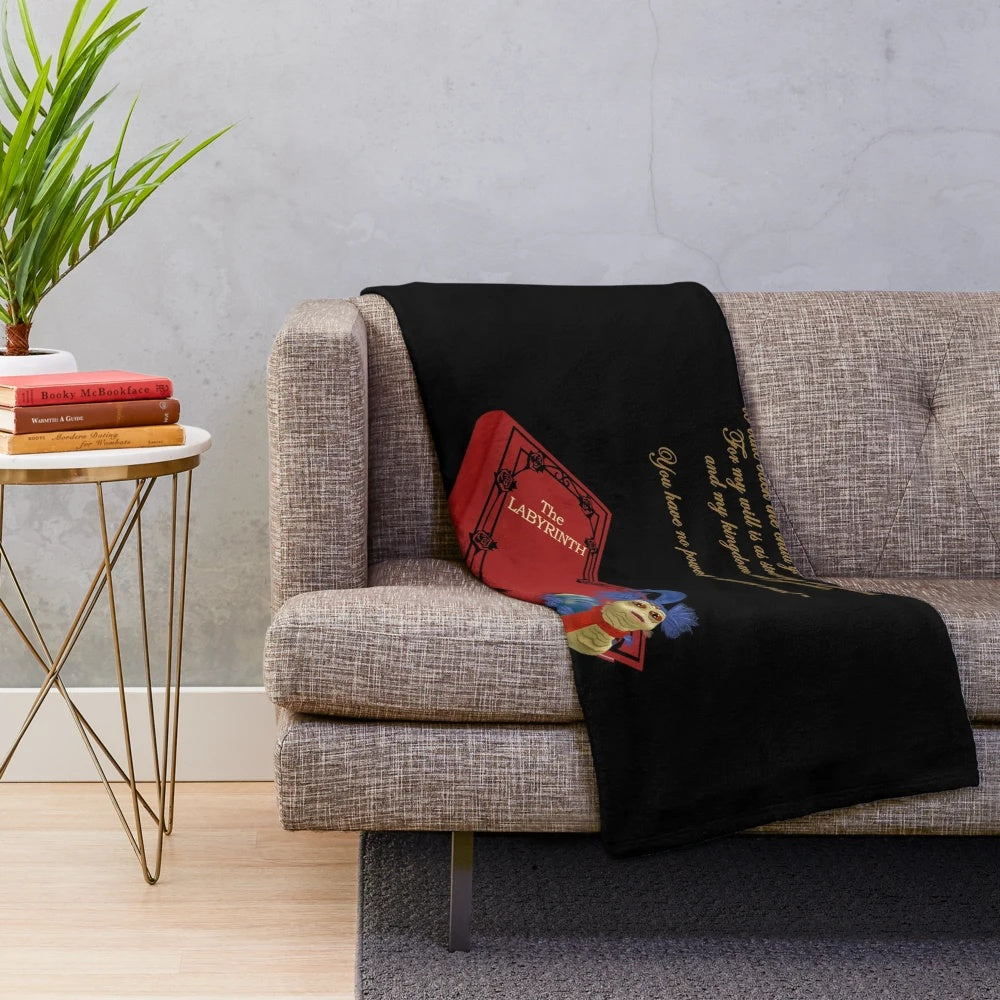 Retro-inspired plush worm blanket featuring a talking feature
