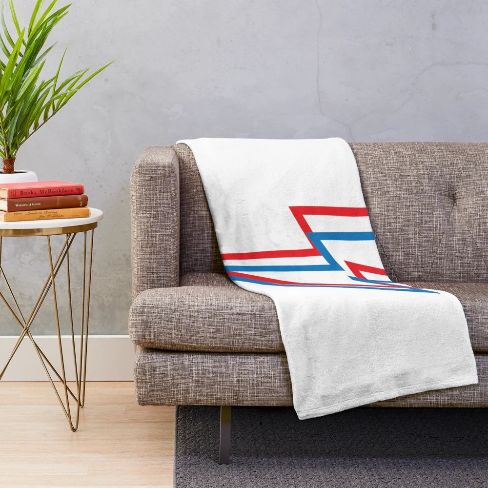 Ziggy Stardust-inspired plush blanket with bold red and blue graphic pattern
