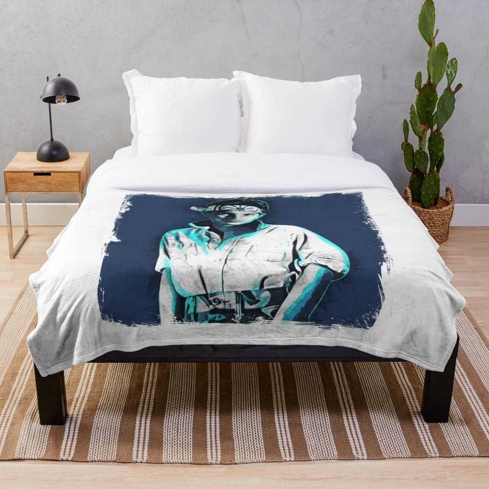 Vintage-style plush blanket featuring Ralph Macchio as Daniel LaRusso from The Karate Kid