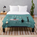 Retro mid century style plush blanket featuring playful kittens and atomic inspired graphics