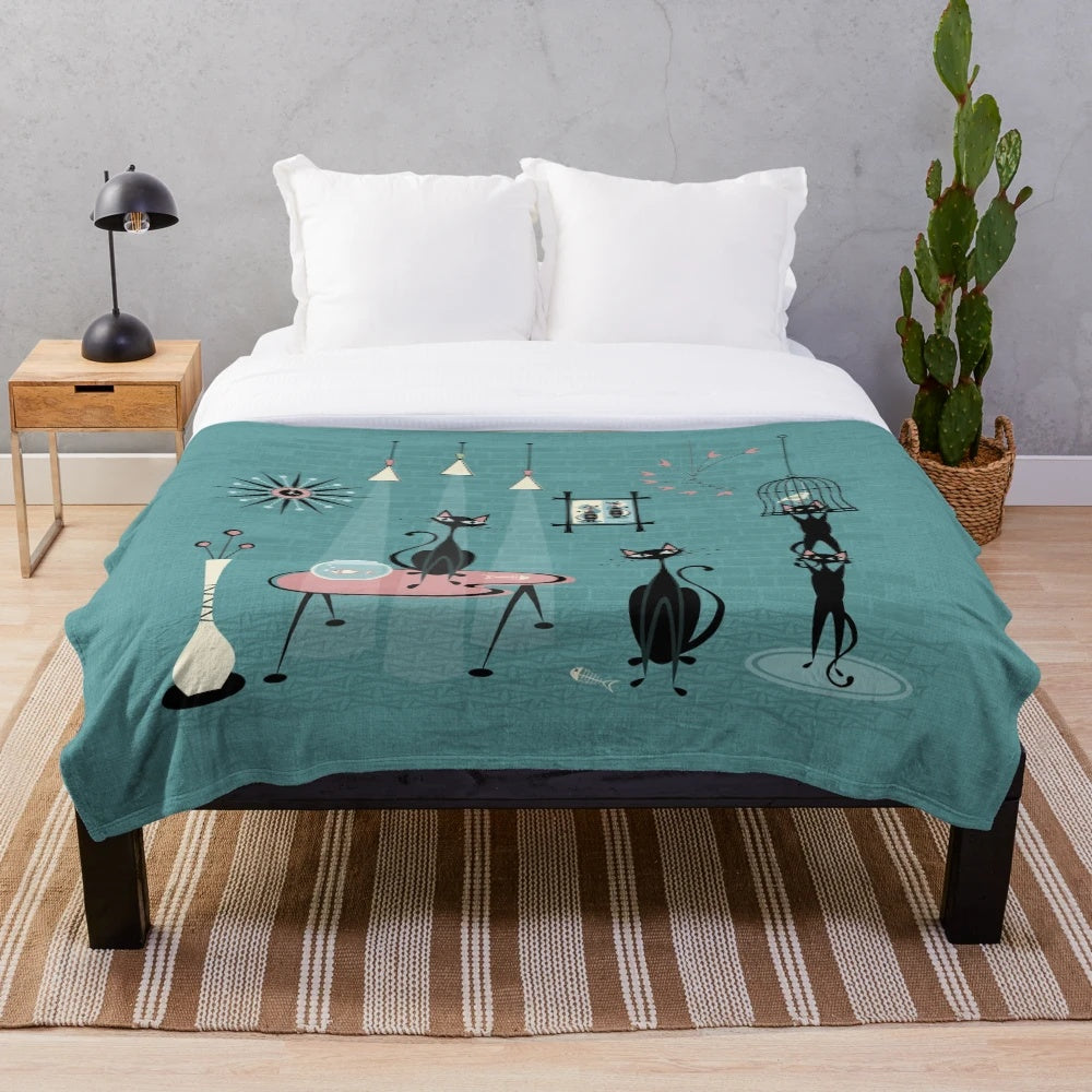 Retro mid century style plush blanket featuring playful kittens and atomic inspired graphics