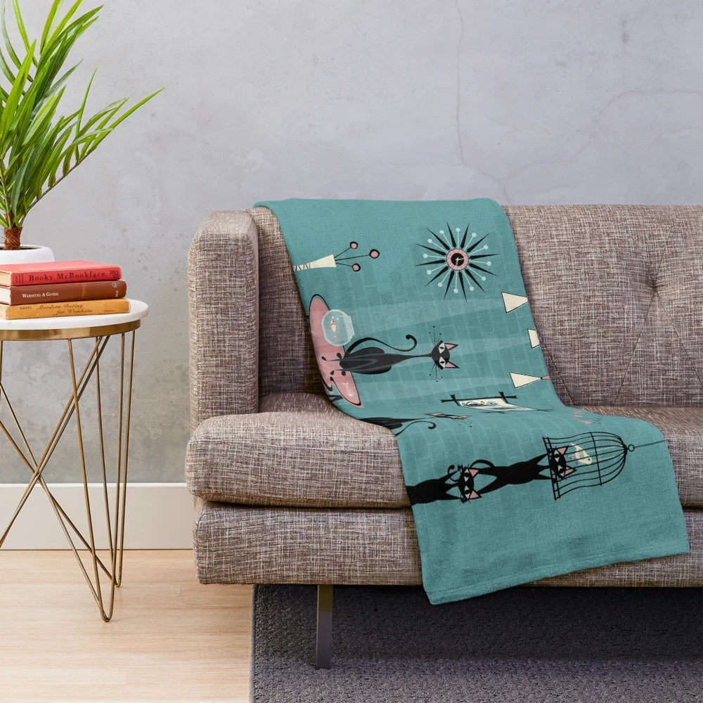 Retro mid century style plush blanket featuring playful kittens and atomic inspired graphics