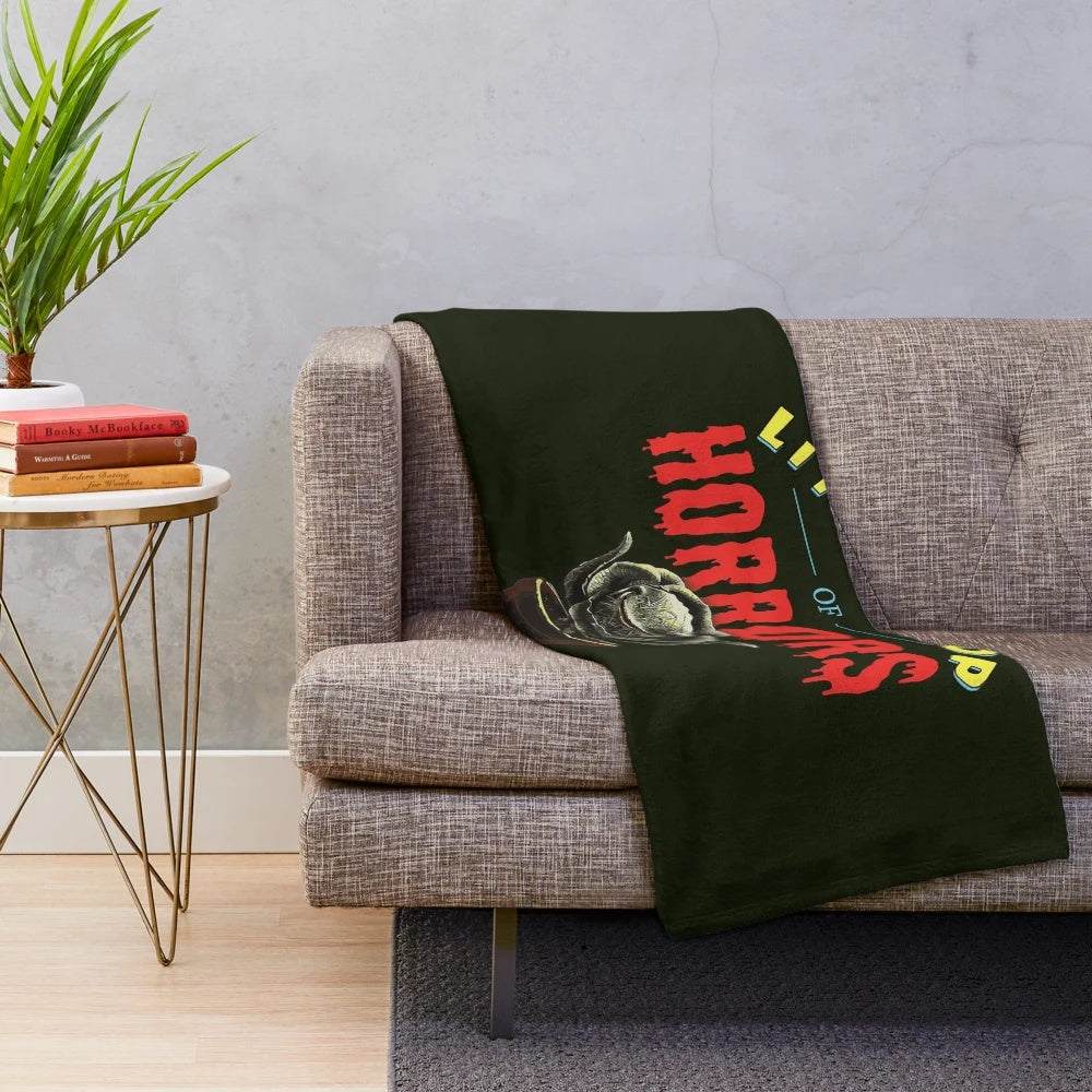 Plush blanket featuring the iconic man-eating plant from the 1986 cult classic film Little Shop of Horrors