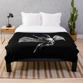 Soft plush blanket with a classic rock logo design