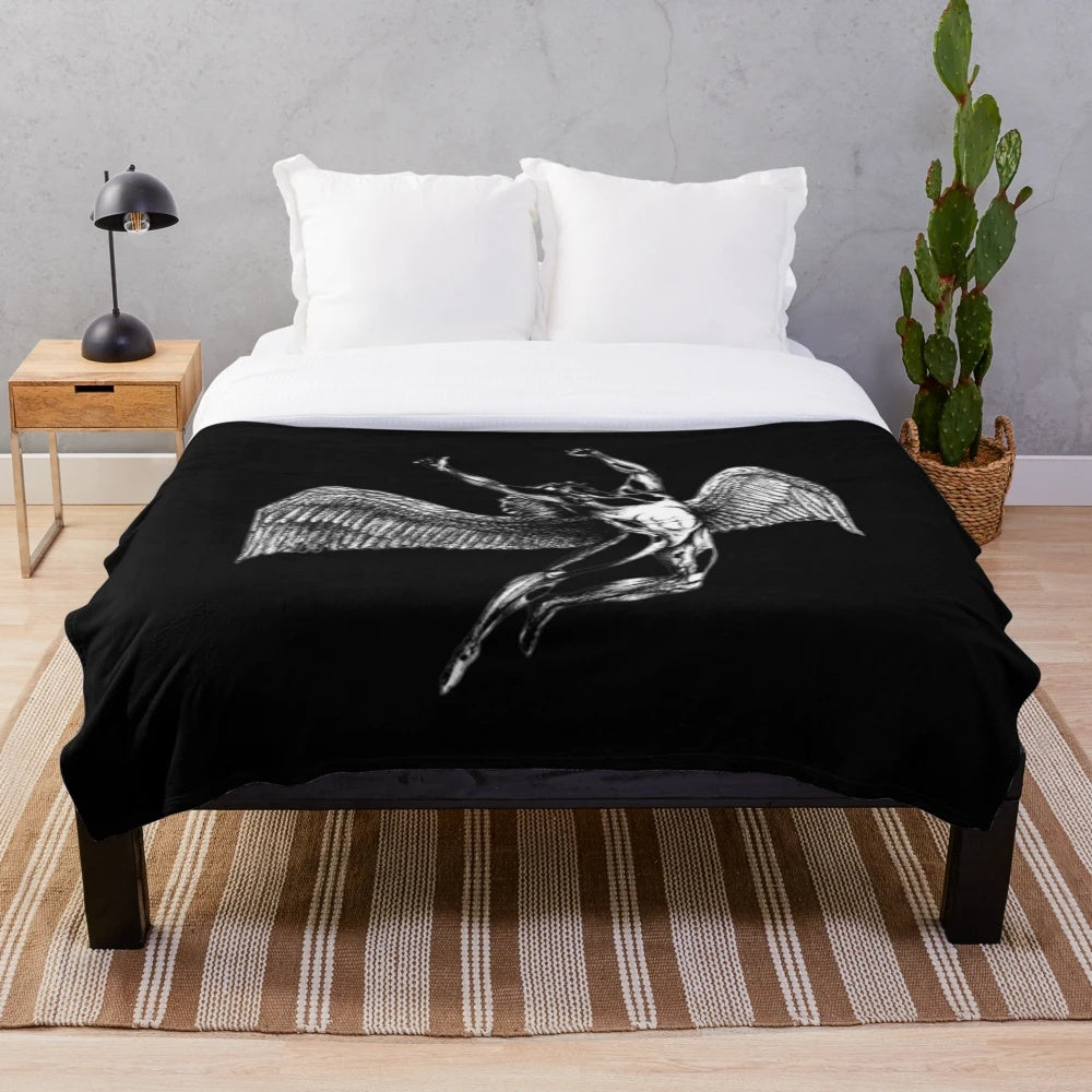 Soft plush blanket with a classic rock logo design