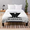 Retro Madness Plush Blanket featuring the iconic logo of the ska band