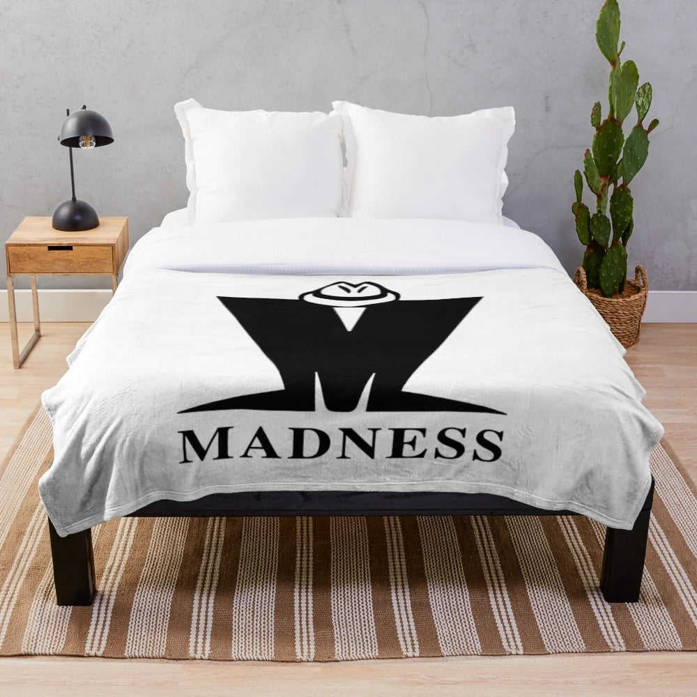 Retro Madness Plush Blanket featuring the iconic logo of the ska band