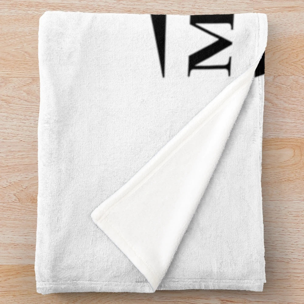 Retro Madness Plush Blanket featuring the iconic logo of the ska band