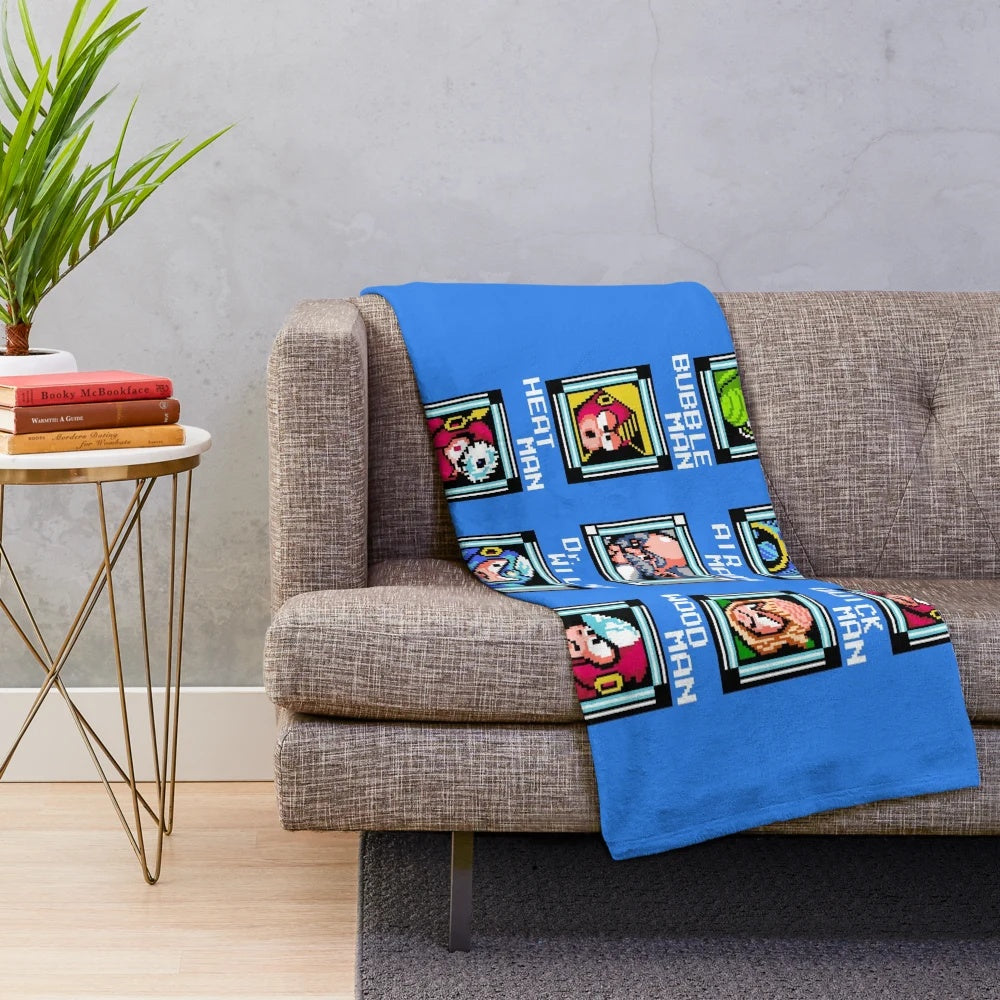 Retro Megaman 2 stage select pixel art design on a plush blanket
