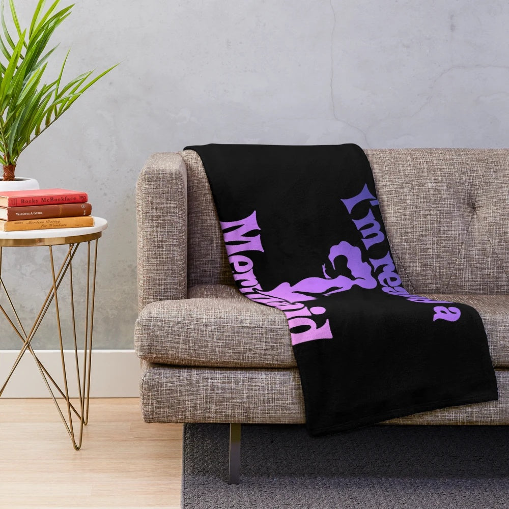 Plush mermaid-themed blanket in pink and white retro design