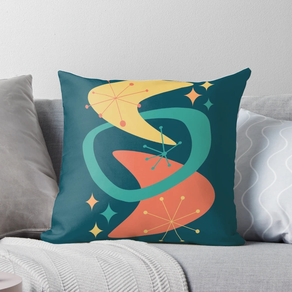 Retro mid century modern charcoal gray throw pillow with atomic age starburst design