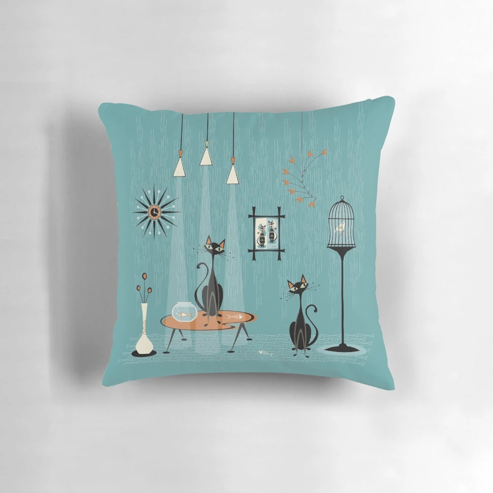 Mid century modern cat pillow with a vibrant atomic-inspired sunburst design and retro cat artwork