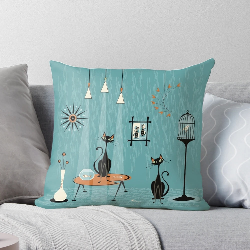 Mid century modern cat pillow with a vibrant atomic-inspired sunburst design and retro cat artwork