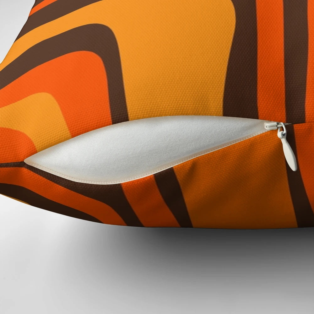 Retro mid-century modern abstract pattern pillow in brown and orange colors