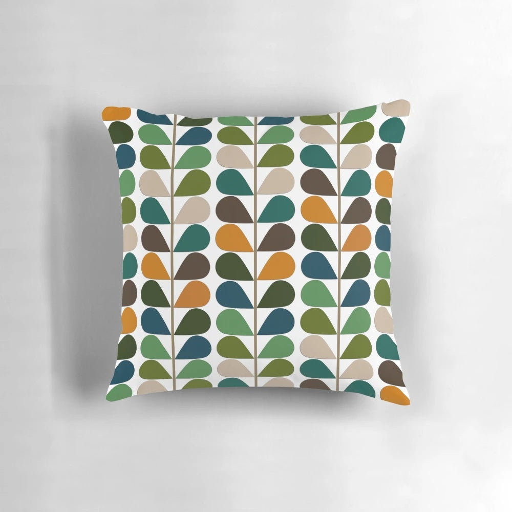 Retro mid-century modern patterned throw pillow in shades of blue, orange, and white.
