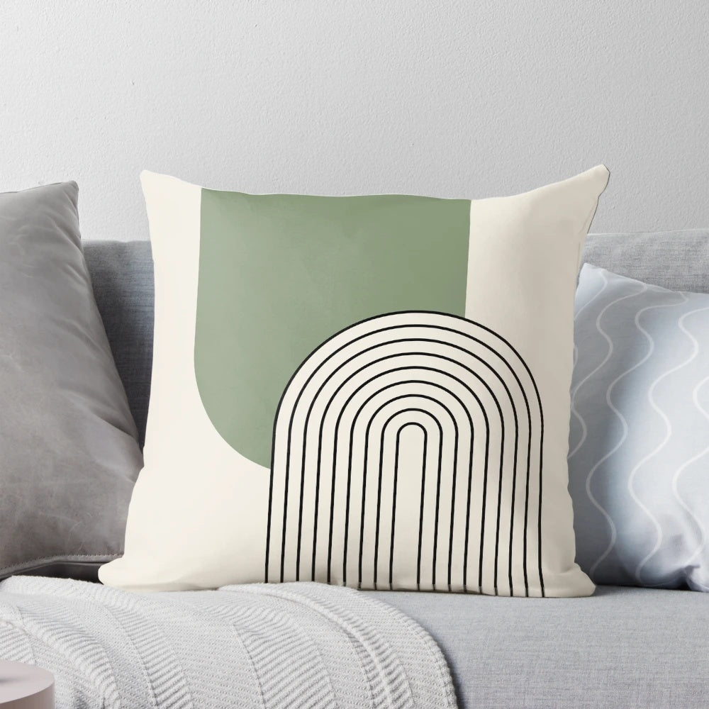 A minimalist mid century style pillow featuring a green arched line design in a modern, abstract aesthetic.
