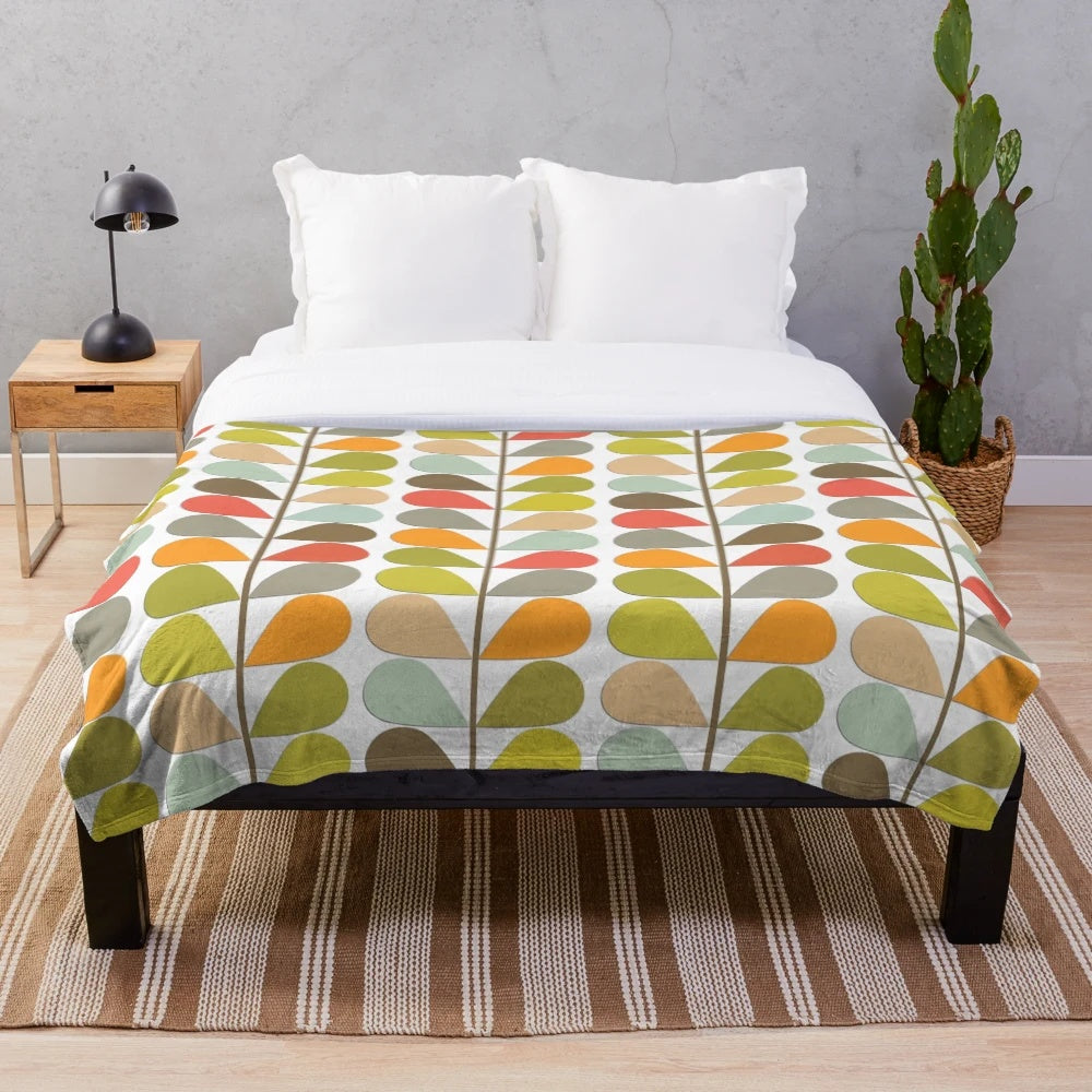 Retro midcentury modern plush blanket with an atomic-inspired pattern