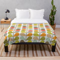 Retro midcentury modern plush blanket with an atomic-inspired pattern