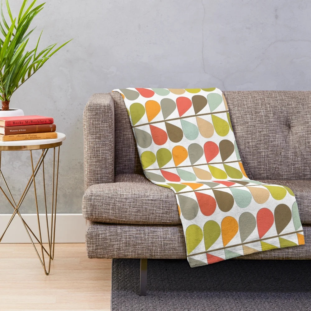 Retro midcentury modern plush blanket with an atomic-inspired pattern