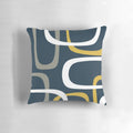 Midcentury modern inspired throw pillow with a geometric abstract pattern in light mustard, grey, white, and navy blue.