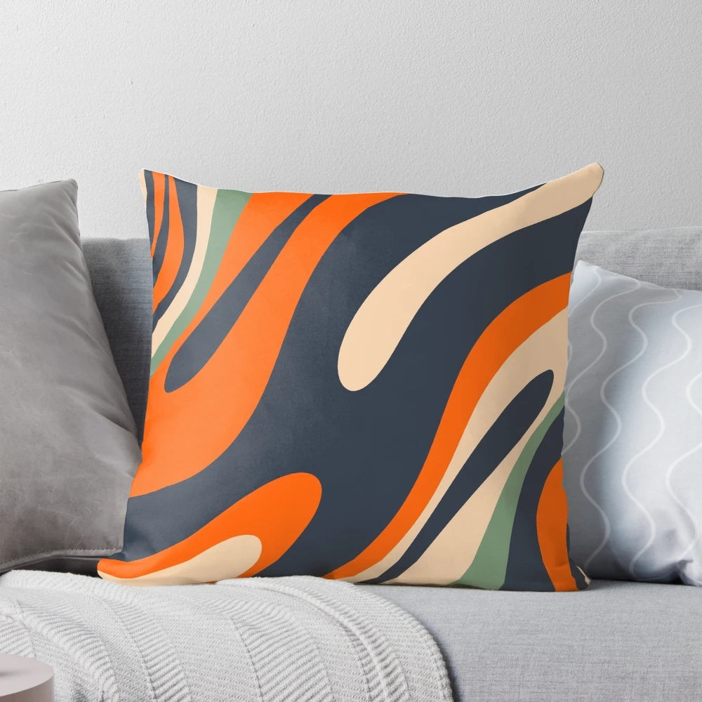 Vibrant abstract pattern in blue, orange, green, and beige tones on a decorative throw pillow with a distorted, trippy visual effect.