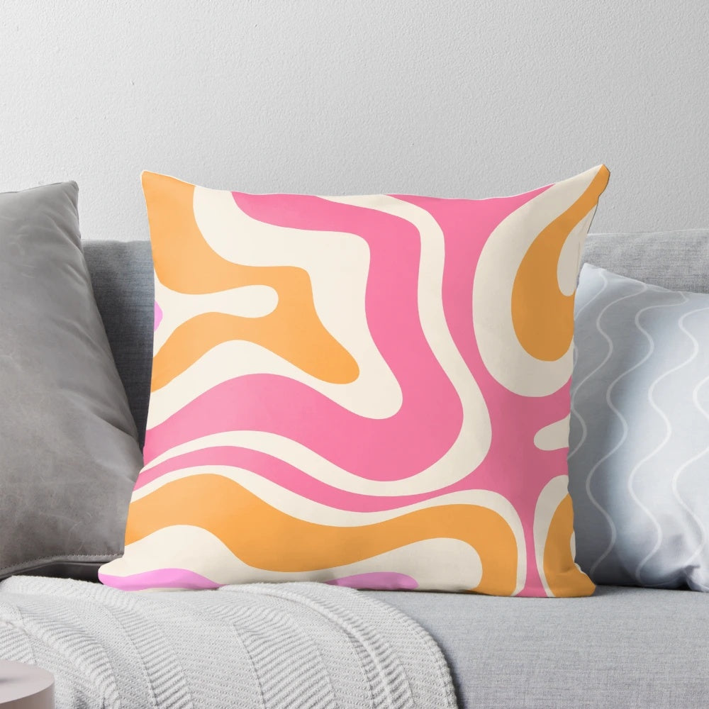 Retro modern abstract swirl pattern decorative throw pillow in shades of pink, orange, marigold, and cream