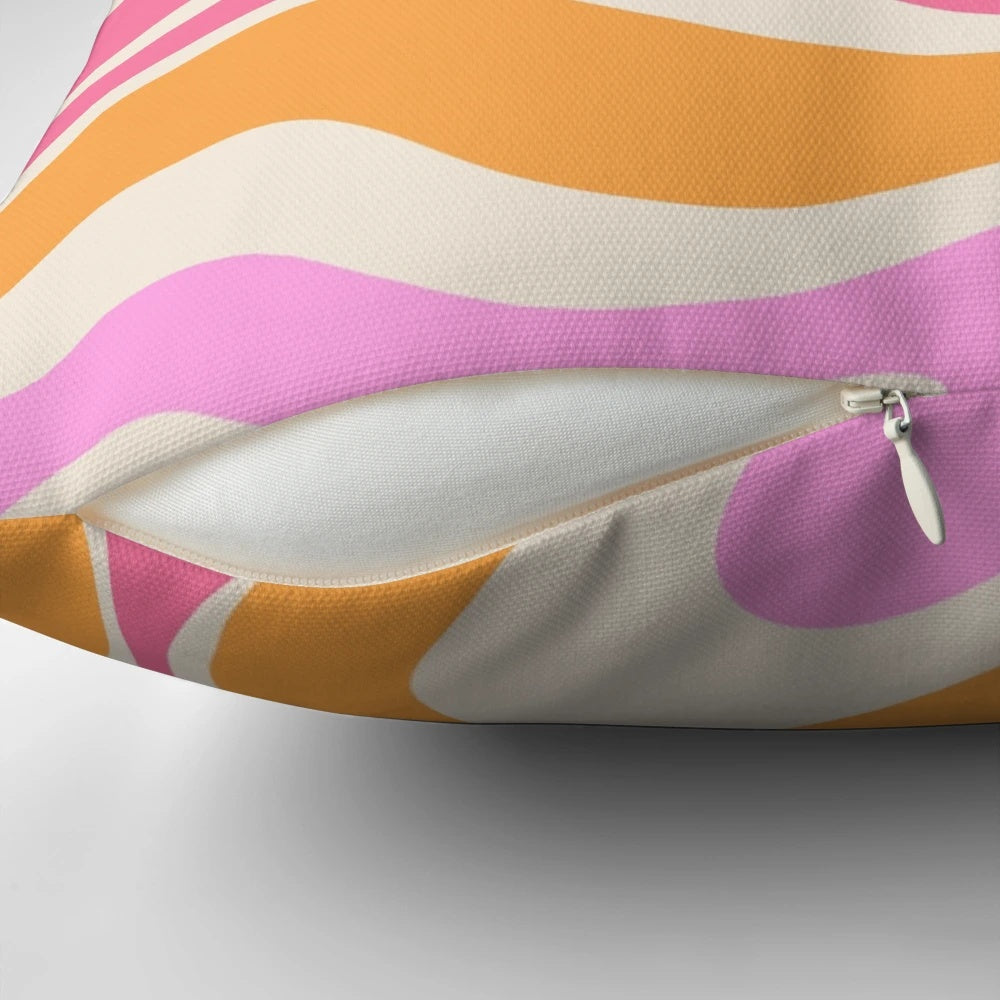 Retro modern abstract swirl pattern decorative throw pillow in shades of pink, orange, marigold, and cream