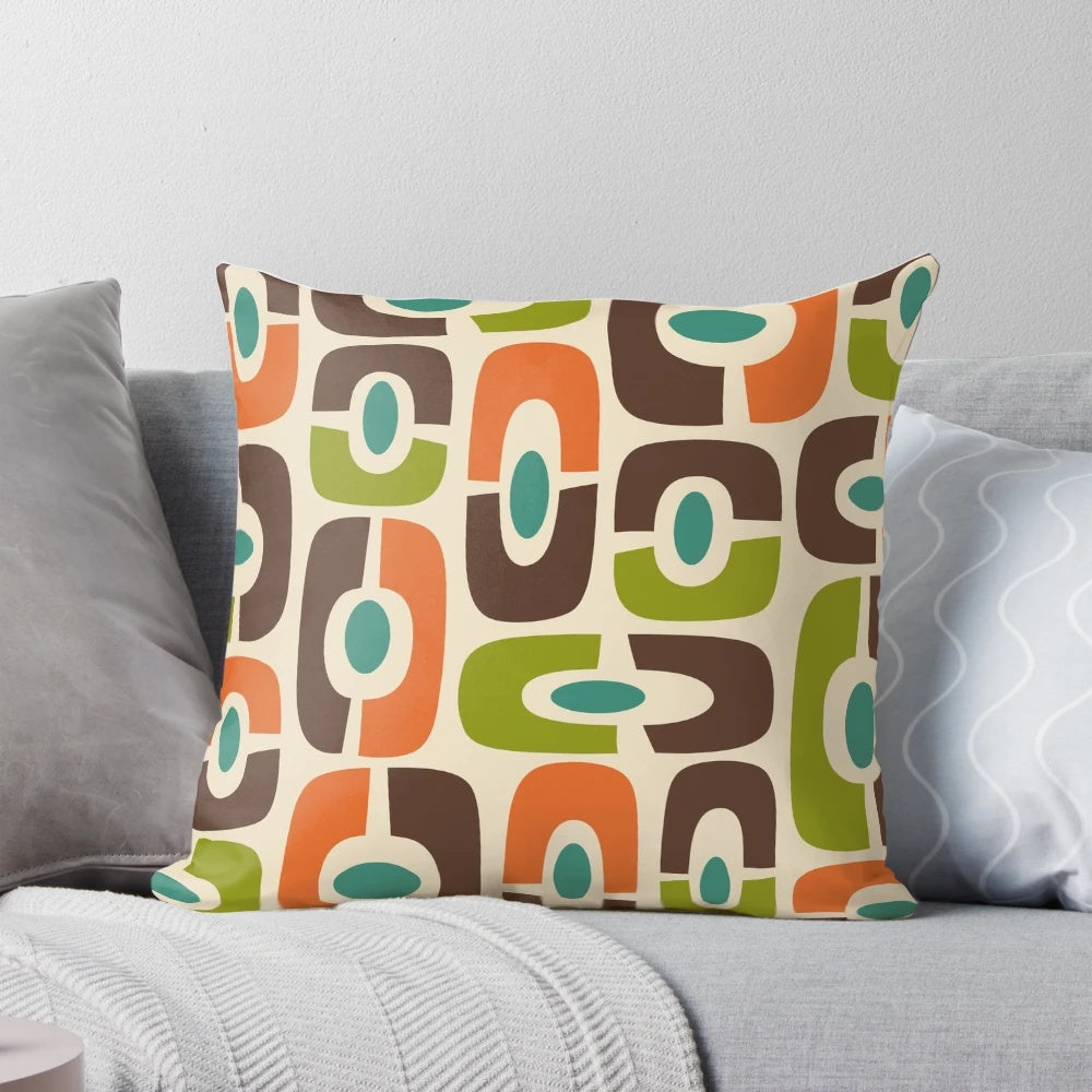 Mid century modern abstract throw pillow in shades of brown, blue, green, orange, and beige