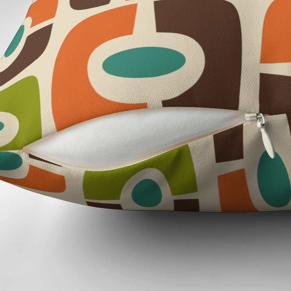 Mid century modern abstract throw pillow in shades of brown, blue, green, orange, and beige
